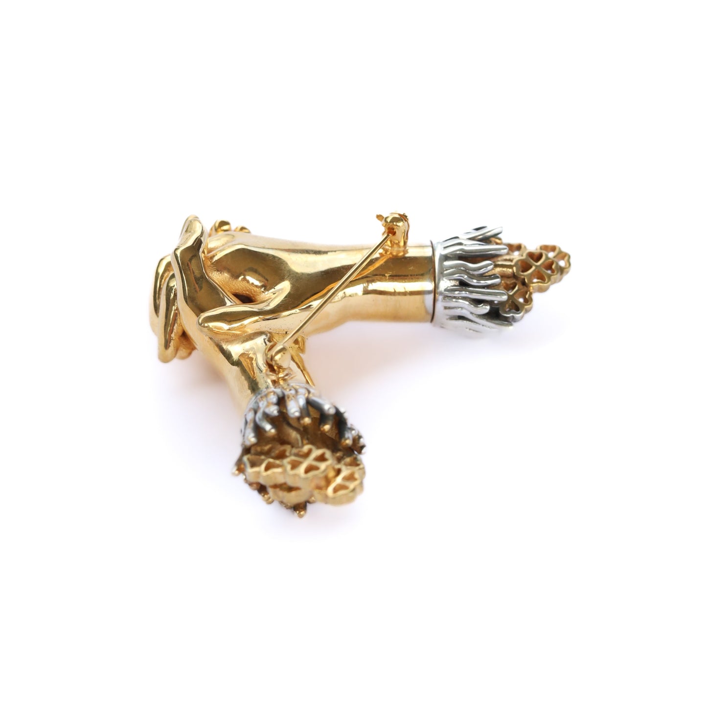 Gold and silver decorative item on a white background