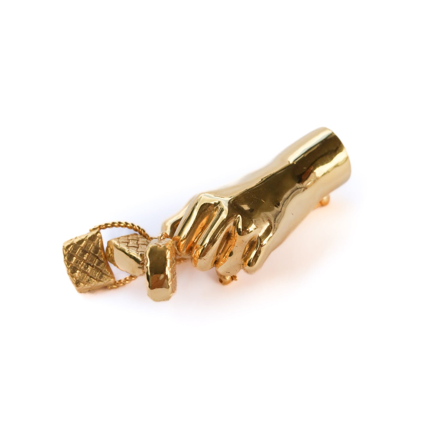 Jenna London gold hand-shaped brooch holding three baskets on a white background