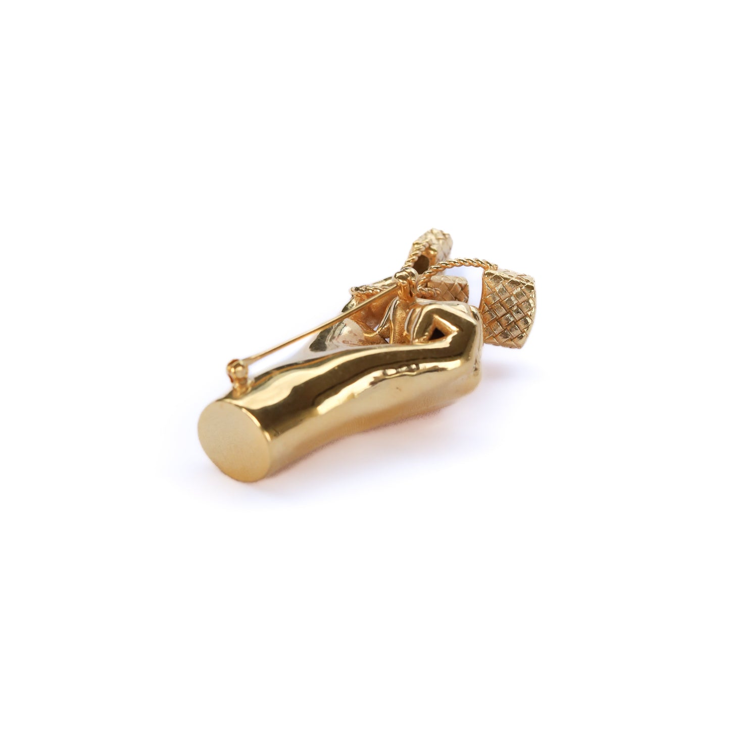 Jenna London gold hand shaped brooch holding three baskets on a white background