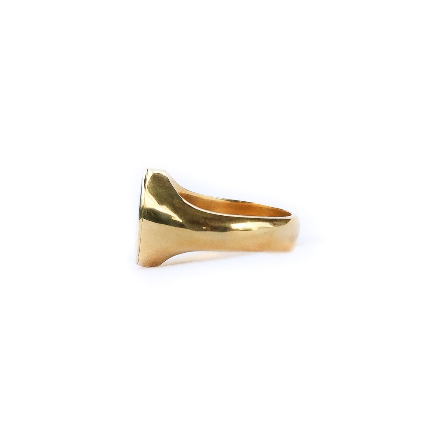 Gold ring on a white background