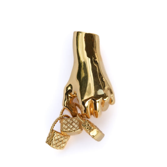 Jenna London gold hand-shaped earring with a three basket charm on a white background